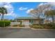 Beautiful gated community pool entrance with a covered patio area for residents to enjoy at 17799 Se 125Th Cir, Summerfield, FL 34491