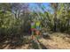 Trailhead with colorful signs in a wooded area, offering trails and adventures for outdoor enthusiasts at 18434 Se 24Th St, Silver Springs, FL 34488