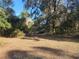 Beautiful spacious land with mature trees and space for a future home at 18434 Se 24Th St, Silver Springs, FL 34488