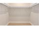 Empty closet with ventilated shelving and white trim at 1929 Nw 85Th Loop, Ocala, FL 34475