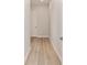 Hallway with beautiful light hardwood floors and neutral wall color, ideal for many decors at 1929 Nw 85Th Loop, Ocala, FL 34475