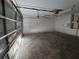 Bright garage featuring automatic door and plenty of open space at 22 Hemlock Ter, Ocala, FL 34472