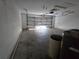 View of the home's functional garage space with attached hardware at 22 Hemlock Ter, Ocala, FL 34472