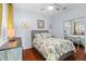 Comfortable bedroom with hardwood floors, closet and bright natural light at 2399 Nw 53Rd Avenue Rd, Ocala, FL 34482
