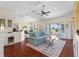 Open floor plan living room features hardwood floors and plenty of light at 2399 Nw 53Rd Avenue Rd, Ocala, FL 34482
