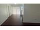 An open dining area featuring wood floors and sliding glass doors at 4 Pine Pass Ter, Ocala, FL 34472