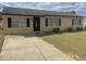Charming single-story home featuring a well-manicured front yard and a welcoming entrance at 4 Pine Pass Ter, Ocala, FL 34472