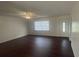 Spacious living room featuring wood floors and plenty of natural light at 4 Pine Pass Ter, Ocala, FL 34472