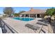 Inviting community pool with lounge chairs and a covered seating area at 5040 Nw 35Th St, Ocala, FL 34482