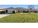 Charming single-story home with a well-maintained lawn and inviting curb appeal at 5040 Nw 35Th St, Ocala, FL 34482