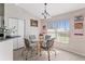 Dining nook featuring an eat-in kitchen with a glass-top table and chairs at 5040 Nw 35Th St, Ocala, FL 34482