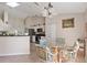 A dining nook featuring an eat-in kitchen with a glass-top table and chairs at 5040 Nw 35Th St, Ocala, FL 34482
