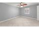 Bedroom boasts tile flooring and a window offering natural light at 5906 Sw 108Th St, Ocala, FL 34476