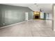 Spacious living room boasts tile floors and plenty of natural light at 5906 Sw 108Th St, Ocala, FL 34476