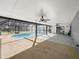 A covered patio that leads to a spacious screened-in pool area at 5906 Sw 108Th St, Ocala, FL 34476