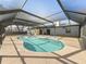 Screened-in pool with a covered patio area, perfect for entertaining guests or relaxing at 5906 Sw 108Th St, Ocala, FL 34476