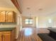 Open dining room with wood floors, natural light, and neutral paint at 6611 Sw 80Th Ave, Ocala, FL 34481