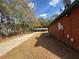 Exterior view of property with lawn, sidewalk, and building in background at 6611 Sw 80Th Ave, Ocala, FL 34481