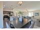 Open-concept dining area adjacent to the kitchen and living room, perfect for modern living at 7772 Sw 146Th Lane Rd, Ocala, FL 34473