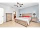 Spacious primary bedroom with neutral tones and a view of ensuite bathroom at 8245 Sw 78Th Terrace Rd, Ocala, FL 34476