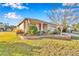 Landscaped front yard featuring lush green lawn and lovely plants at 8245 Sw 78Th Terrace Rd, Ocala, FL 34476