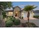 Charming single-story home featuring a manicured front yard and a welcoming entrance at 8670 Sw 88Th Pl, Ocala, FL 34481
