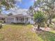 Inviting single-story home with a well-manicured front yard and attached garage at 8888 Sw 95Th Ln # D, Ocala, FL 34481