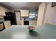 Kitchen featuring black appliances and light countertops at 1008 Se 26Th St, Ocala, FL 34471