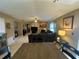 Open-concept living room with tile flooring and fireplace at 1008 Se 26Th St, Ocala, FL 34471
