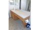 Bathroom featuring a long countertop, a single sink, and neutral tile flooring at 13100 Se 93Rd Terrace Rd, Summerfield, FL 34491