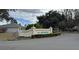 Entrance to the St. Andrews neighborhood with sign and landscaped grounds at 13100 Se 93Rd Terrace Rd, Summerfield, FL 34491