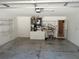 Garage features hot water heater, shelving and storage space at 1546 Sw 153Rd Sw Ct, Ocala, FL 34481