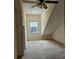 Bedroom with natural light, neutral carpet, and a window with a view at 162 Riggings Way, Clermont, FL 34711