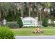 Attractive entrance sign for Summerglen Golf Club Living, surrounded by lush greenery at 16276 Sw 14Th Ct, Ocala, FL 34473