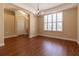 Dining room with wood floors, neutral walls, plantation shutters, and chandelier, perfect for entertaining guests at 16276 Sw 14Th Ct, Ocala, FL 34473