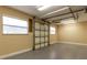 An empty space in the garage offering the opportunity to create storage space with a clean background at 16276 Sw 14Th Ct, Ocala, FL 34473