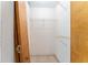 Walk-in closet featuring built-in shelving for organized storage at 17153 Se 79Th Street Rd, Ocklawaha, FL 32179