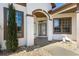 Inviting front entrance featuring decorative stonework and manicured landscaping at 17818 Se 120Th Ct, Summerfield, FL 34491