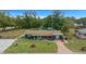 Aerial view of the property displaying the house's layout, large yard, and surrounding neighborhood at 1905 Nw 25Th Ave, Ocala, FL 34475