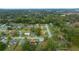 Aerial view of a residential neighborhood with lush green trees and single-Gathering homes with manicured lawns at 1905 Nw 25Th Ave, Ocala, FL 34475