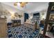 Nicely decorated bedroom with wooden accents, decorative shelving and a plush area rug at 1905 Nw 25Th Ave, Ocala, FL 34475