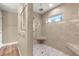 Walk-in shower featuring marble tile, corner seat, overhead rain shower head, and a bright window at 20396 Sw 79Th Lane, Dunnellon, FL 34431