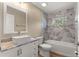 Bathroom with a tile backsplash, a walk-in shower, and a modern white vessel sink at 20396 Sw 79Th Lane, Dunnellon, FL 34431