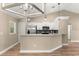 Well-lit kitchen featuring granite countertops, stainless steel appliances and modern light fixtures at 20396 Sw 79Th Lane, Dunnellon, FL 34431