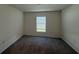 Cozy bedroom featuring neutral walls, carpet, and a window at 243 Marion Oaks Trl, Ocala, FL 34473