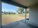 Expansive backyard with ample open space and a covered patio at 2728 Sw 154Th Place Rd, Ocala, FL 34473