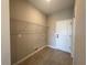 Functional laundry room with modern connections and ample shelving at 2728 Sw 154Th Place Rd, Ocala, FL 34473