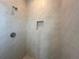 Tiled shower stall with built in shelf and modern fixtures at 2728 Sw 154Th Place Rd, Ocala, FL 34473