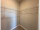 Functional walk-in closet with wire shelving, offering ample storage space at 2728 Sw 154Th Place Rd, Ocala, FL 34473