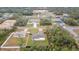 This aerial view highlights the home's position in the neighborhood, featuring a long driveway at 3125 Sw 172Nd Lane Rd, Ocala, FL 34473